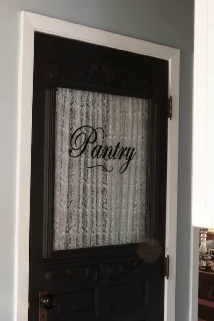 Antique Pantry Door on covered coat closet