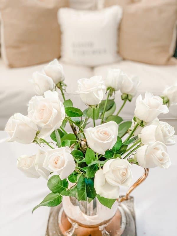 photo of fresh roses in front of my sofa in my living room