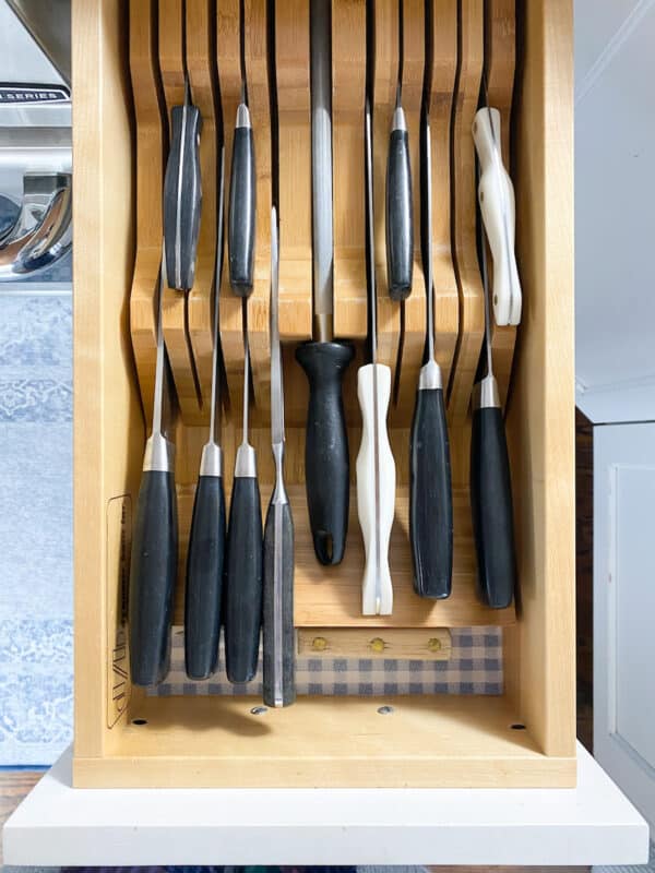 a knife drawer with an organizer insert.