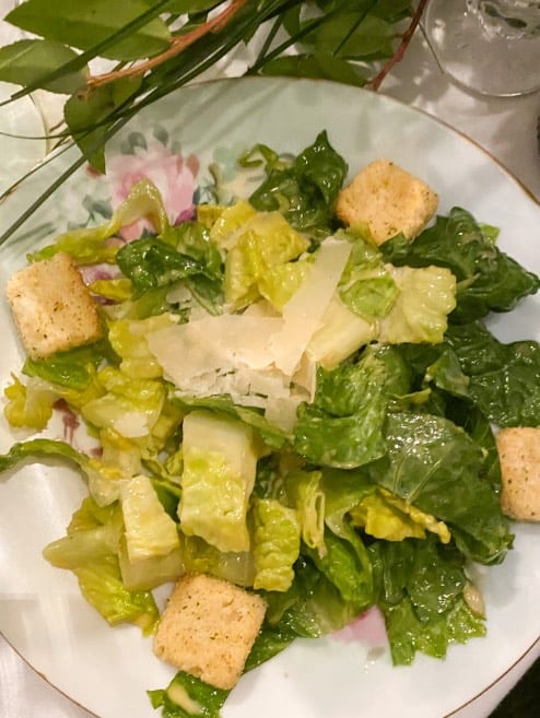 caesar salad as a side that was served at Annie's backyard wedding.
