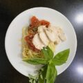 chicken breast with tomato basil sauce on pasta