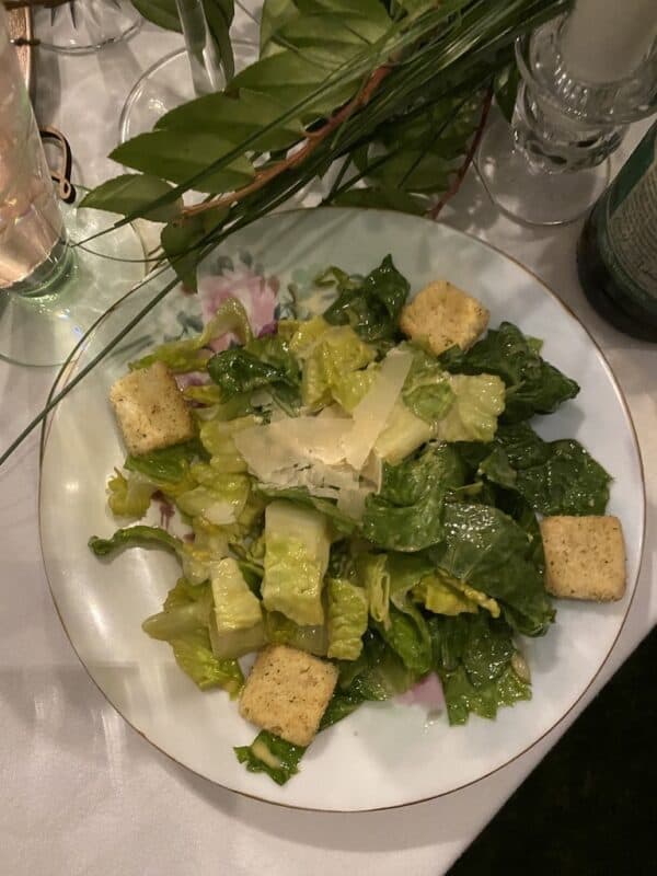 beautiful fresh romaine salad that contains romaine, homemade caesar dressing with croutons