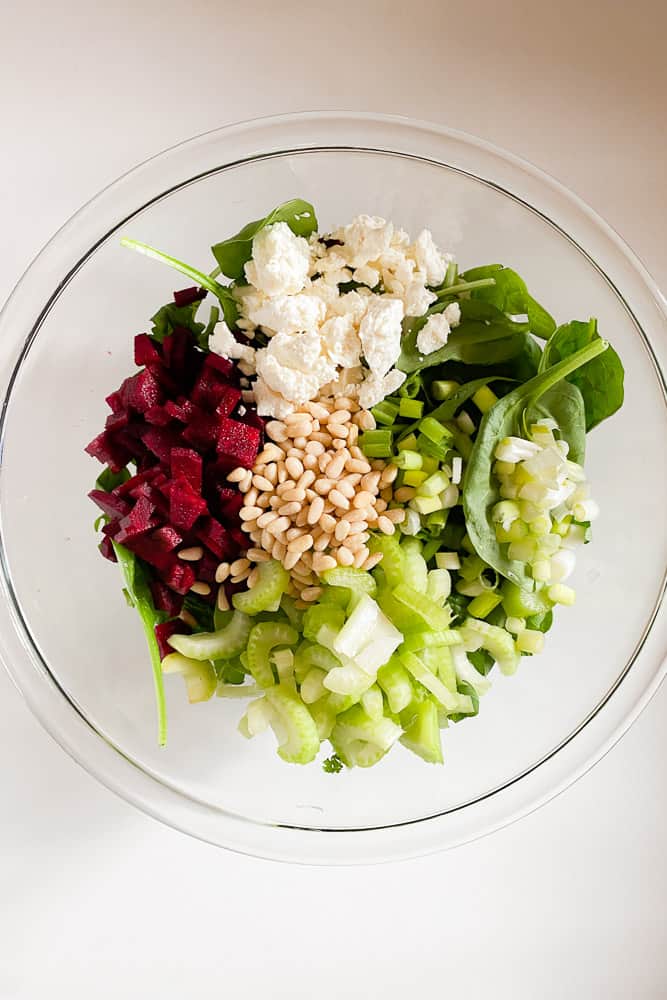 ingedients for beet salad in glass bowl