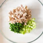 diced chicken with peas and celery ready for chicken salad