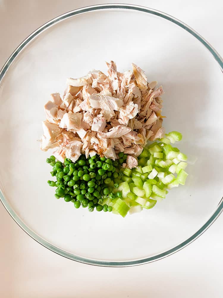 diced chicken with peas and celery ready for chicken salad