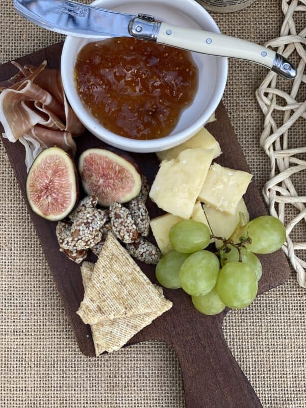 Individual charcuterie boards next to each place setting