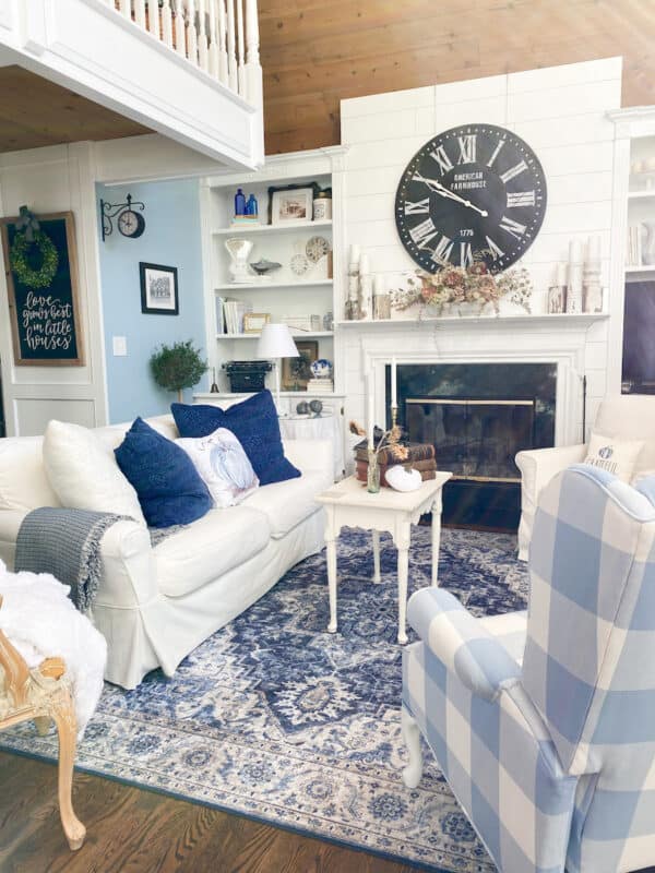 a side view of our family room with the navy and white rug