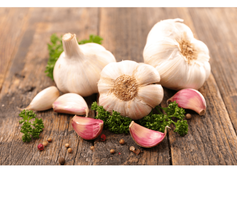 Picture of Garlic on a raw wood table