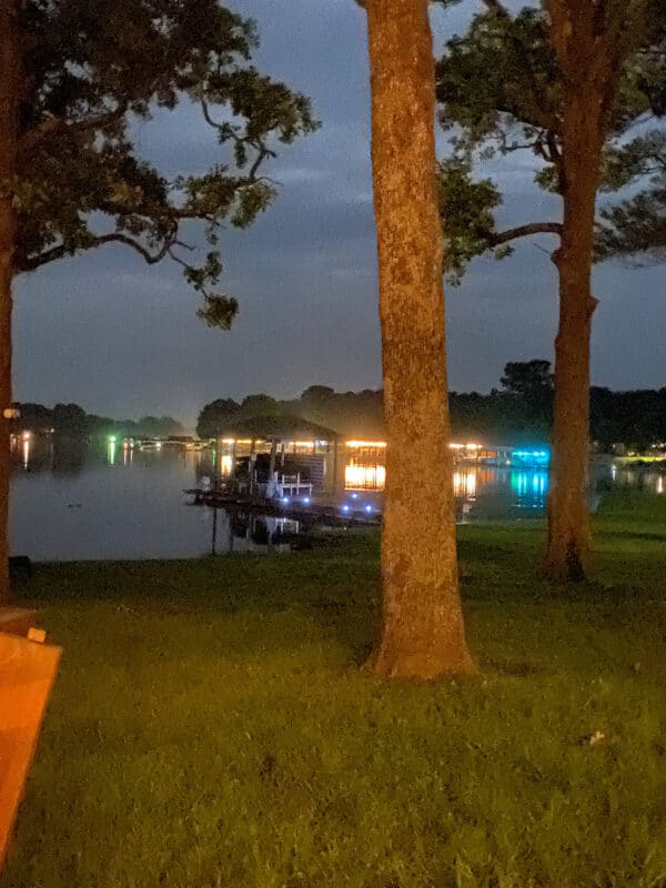 View of the lake and lit up homes on the lake from our Airbnb
