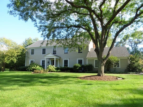 two story colonial home that I lived in in the mid 80's It was red when I owned it now it is beige