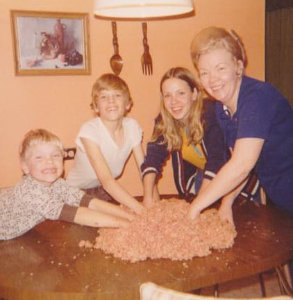 Me as a teenager making potato sausage with my mom and two younger brothers.