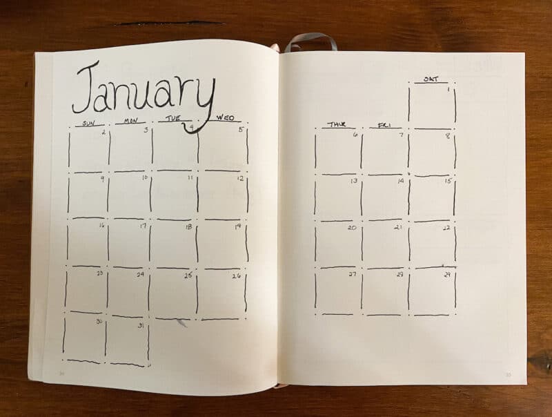bullet journal January 2022 monthly calendar on two pages
