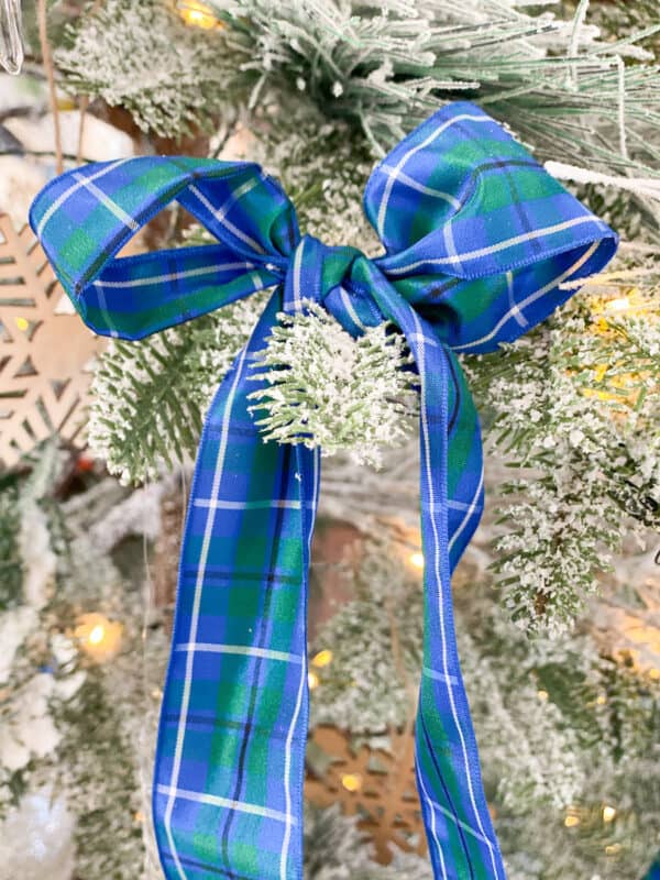 Tartan plaid ribbon used on the Christmas tree for a budget friendly decor