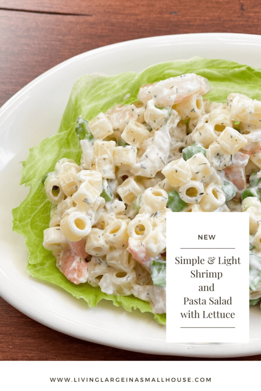 Pinterest Pin picture of pasta and shrimp salad with a overlay that says "Simple & Light Shrimp & Pasta Salad on Lettuce"