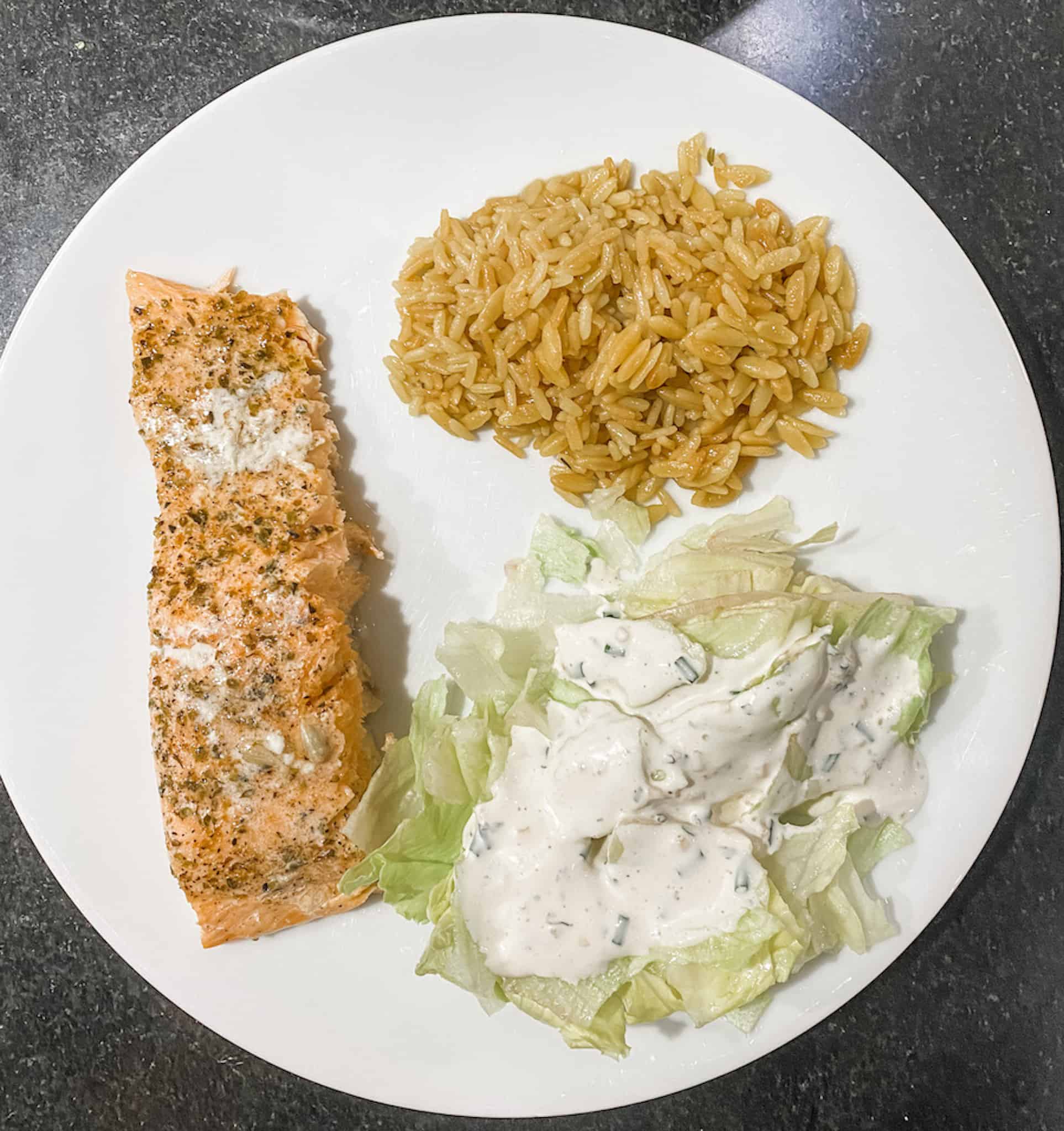 baked salmon with orzo and a side salad. The recipe is part of my guide to preparing a monthly meal plan