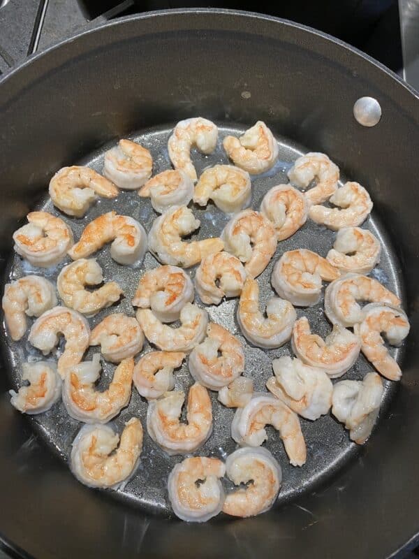 shrimp in saute pan just about cooked