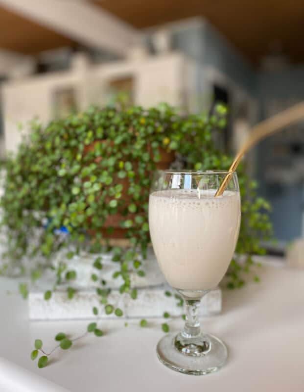 a glass with a frappuccino coffee in it