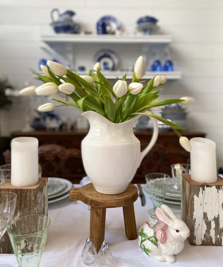 Spring Table with White ironstone pitcher in the center filled with white tulips for a spring refresh
