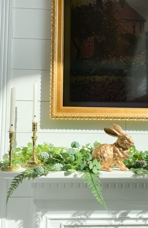 the starting of the layering of the whimsical budget-friendly spring mantel