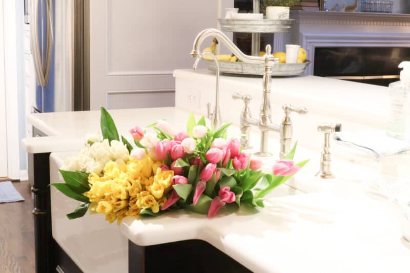 sink filled iwth flowers for easter brunch