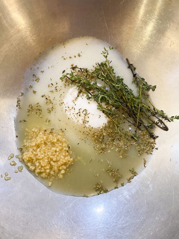 picture of a large bowl with all the ingredients for a brine for the chicken