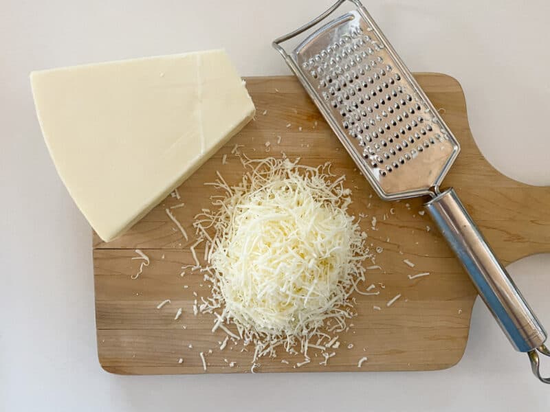 Freshly grated asiago cheese