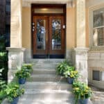 the front porch of a 3-flat walk-up in the city of Chicago