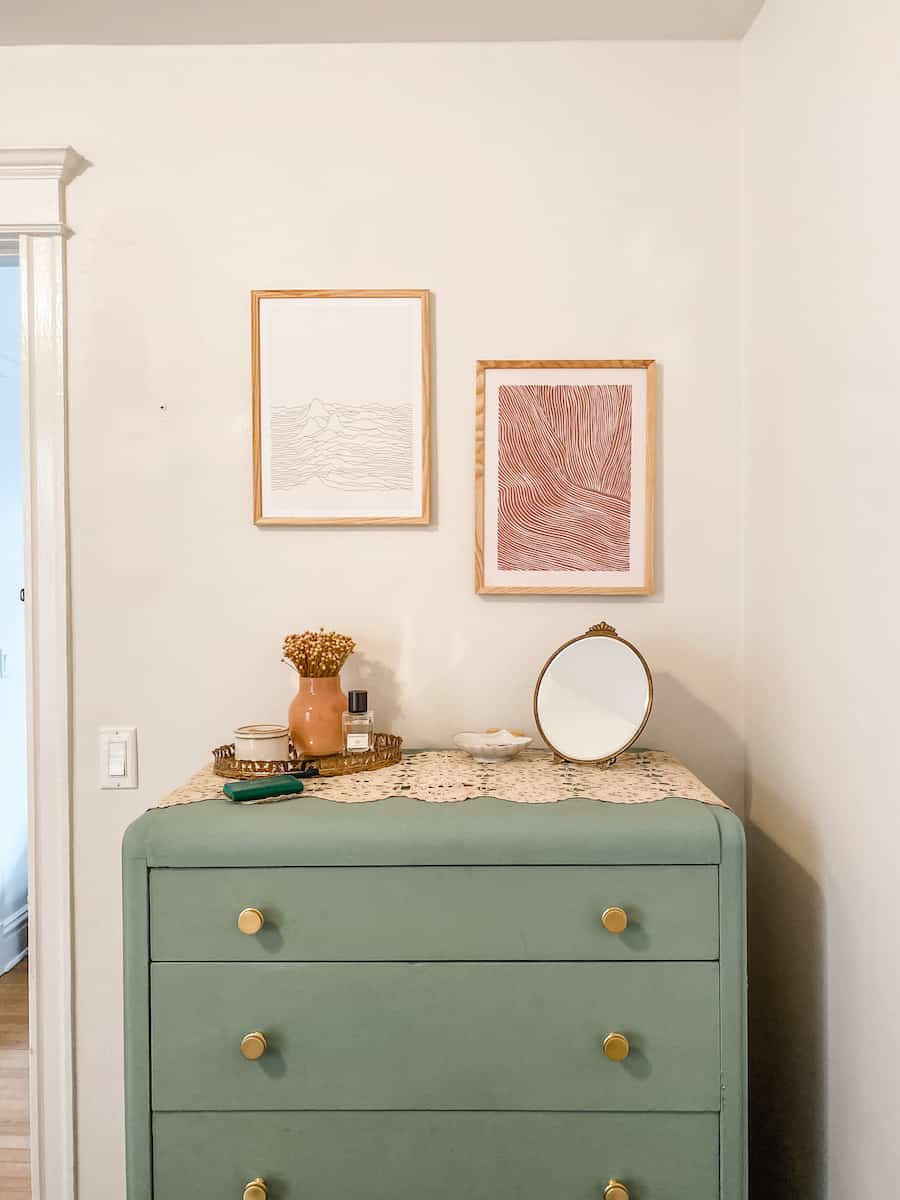 Emma's vintage dresser with two Photowall prints above it.