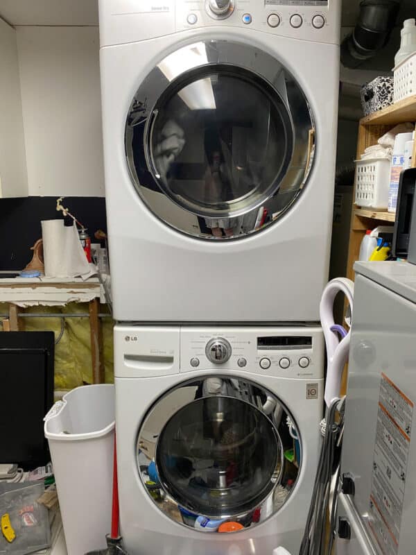previous stacked washer and dryer before our small laundry room makeover
