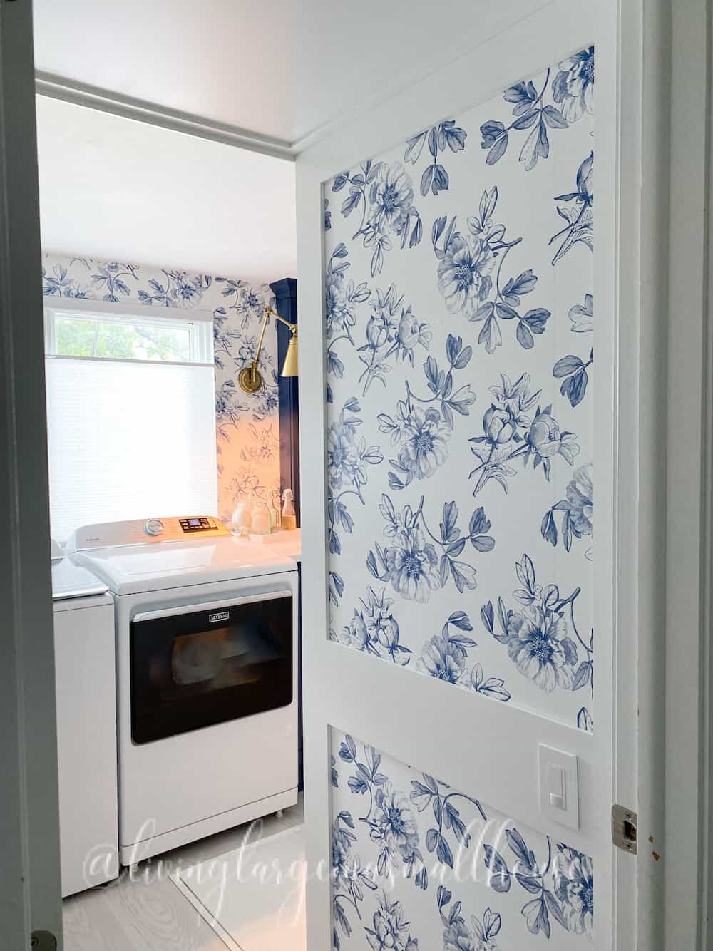 peeking in the door after out small laundry room makeover