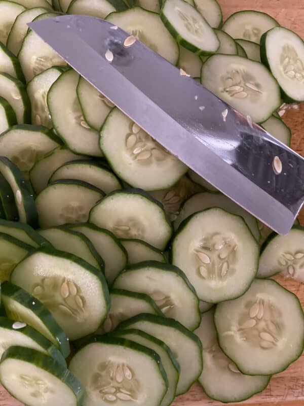 cucumbers cut into chips and ready to make crunchy dill pickles