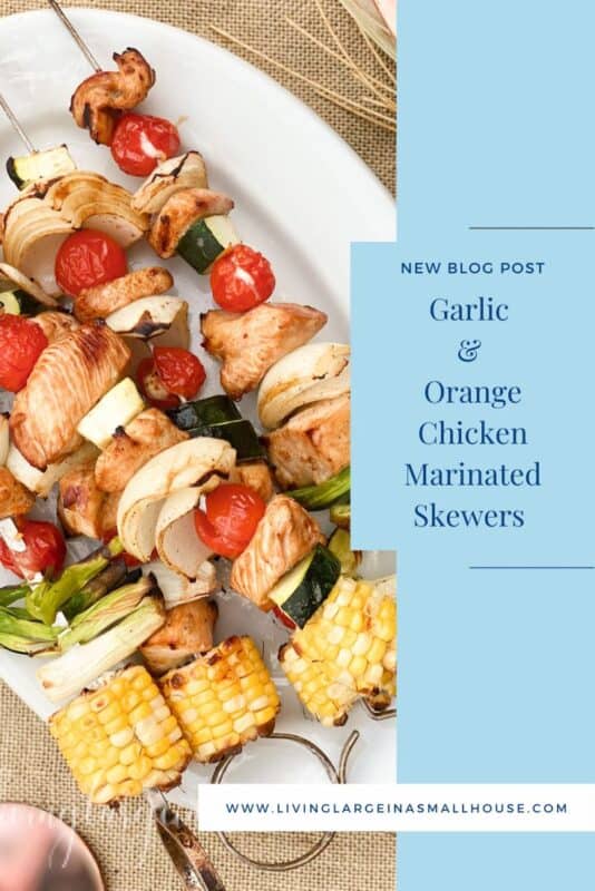 pinterest graphic with a picture of marinated chicken skewers with an overlay that says Garlic & Orange marinated skewers
