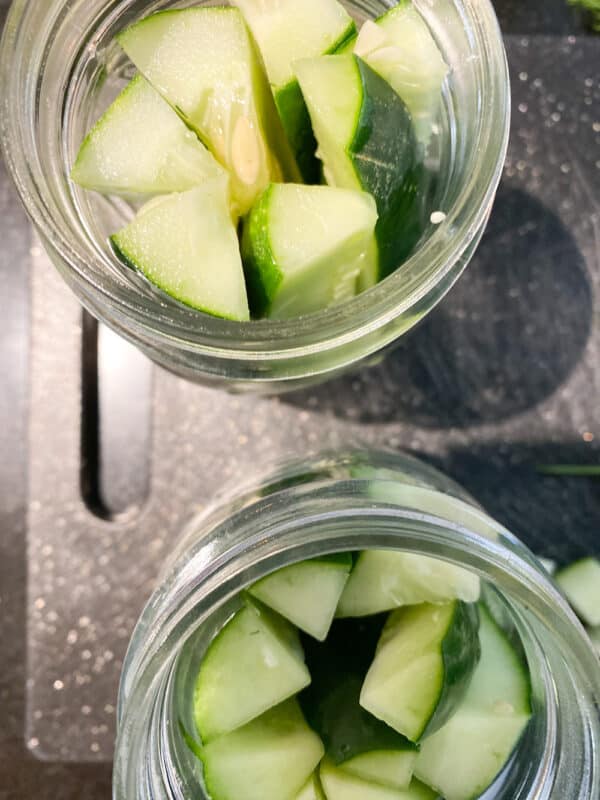 cucumber spears in pints waiting for pickle brine