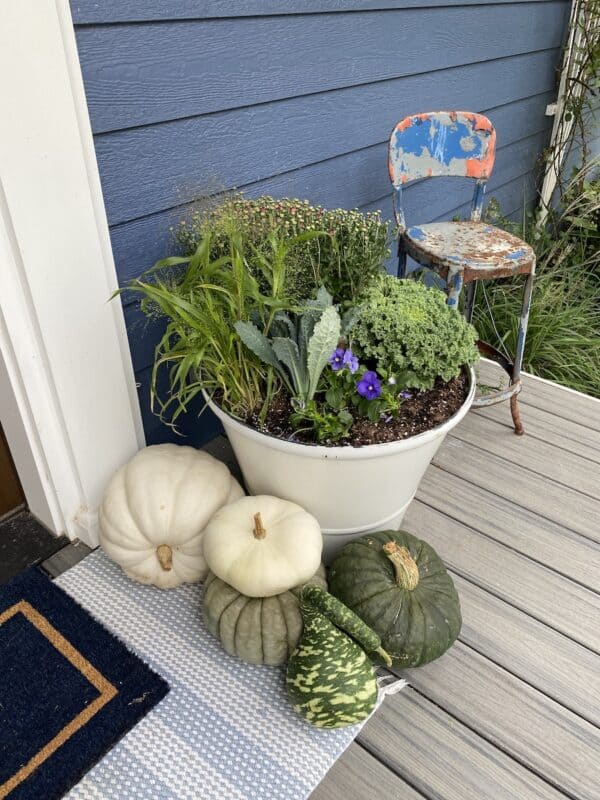 refreshing my pots with fall flowers is my best simple fall porch decor ideas