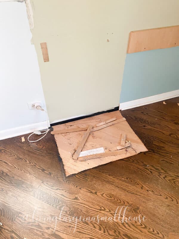 the hardwood floors that aren't refinished under the desk. Issues in the one room challenge
