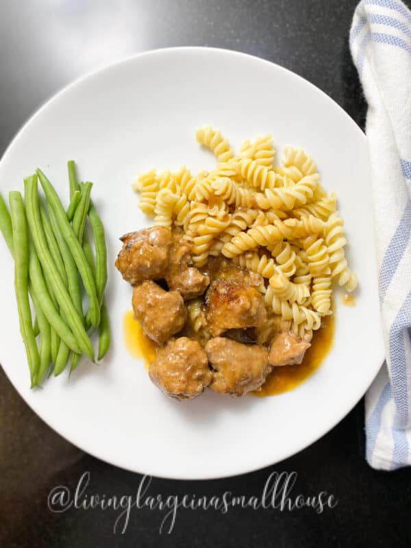 swedish meatballs with noodles and beans plated for dinner