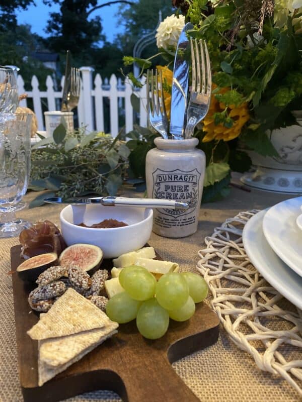 individual charcuterie boards and vintage advertising pots on my harvest tablescape while dining alfresco