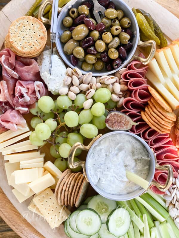 a view of meats, cheeses, nuts, crackers and dips on my fall charcuterie board