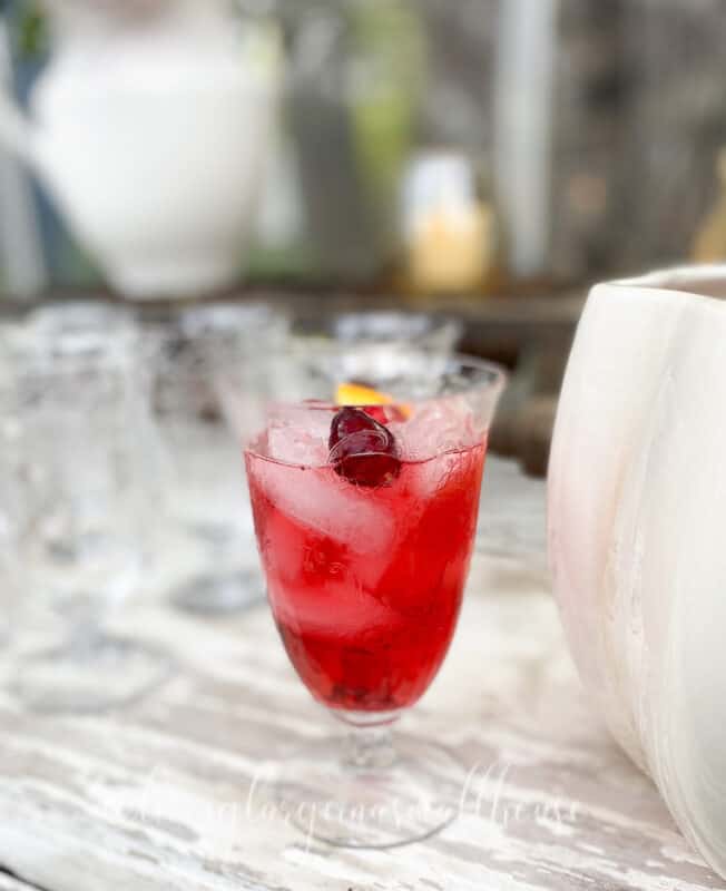 a holiday cranberry punch in vintage glassware