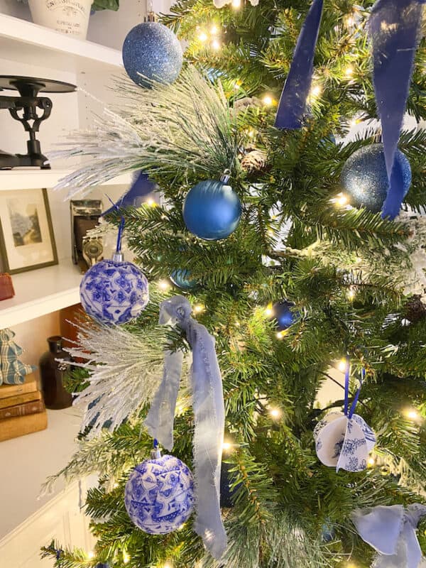 mix of bought blue balls and decoupage homemade christmas ornaments on my French country christmas tree