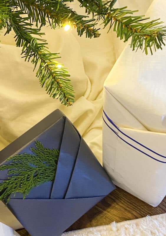 top view of gifts wrapped in blue and white Kraft paper. inexpensive way to wrap gifts