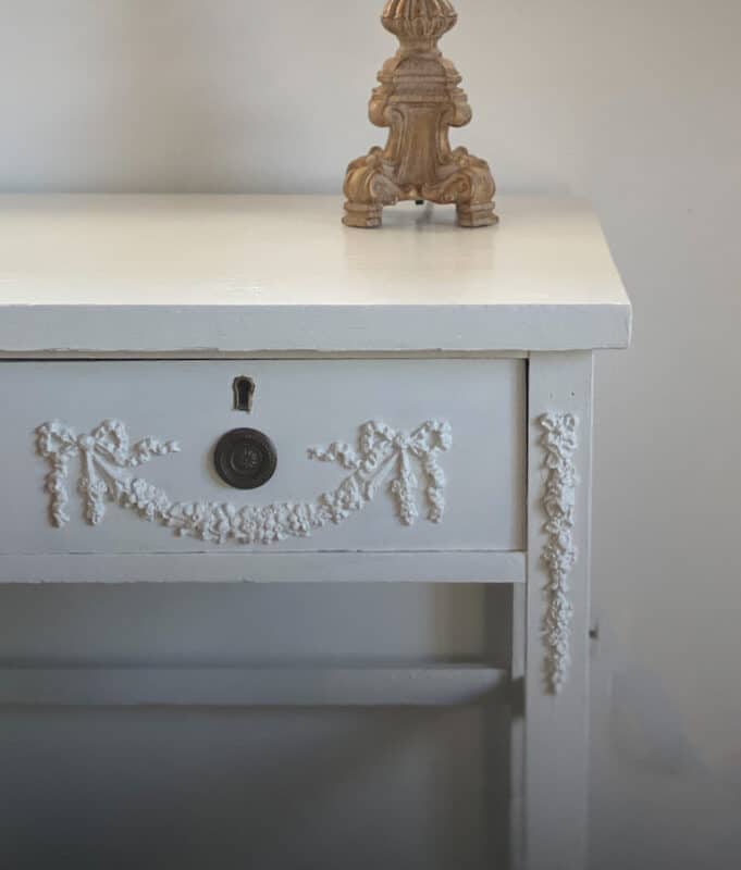 an antique desk painted white for the one room challenge
