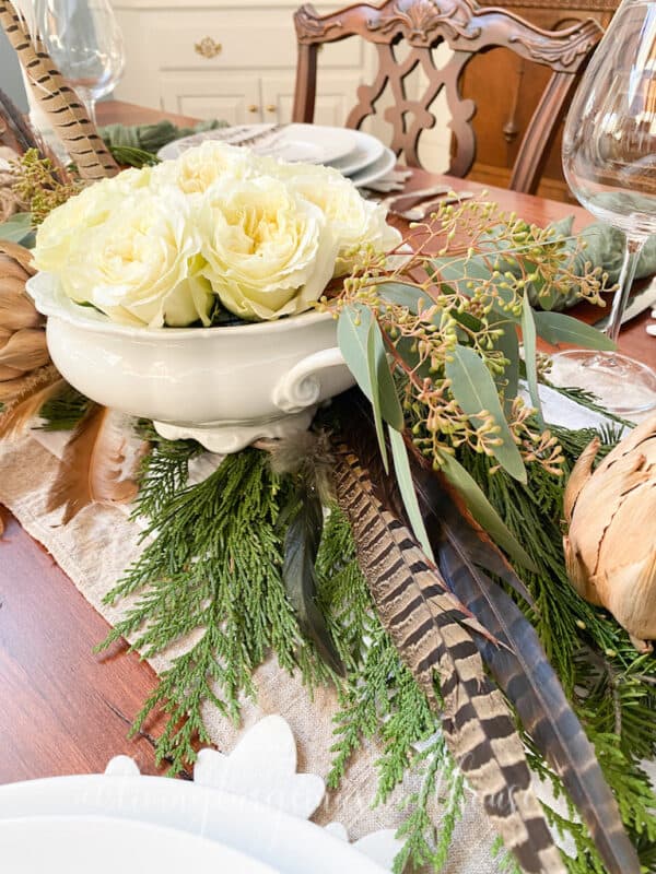 sideview of the floral centerpiece for the woodland christmas tablescape