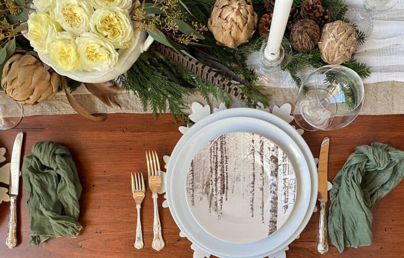 a view of the whole place setting on the woodland christmas tablescape