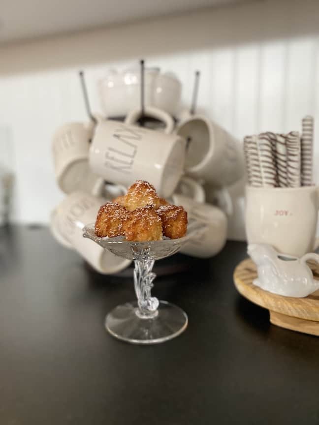 store bought coconut macaroons dusted with powdered sugar to look homemade