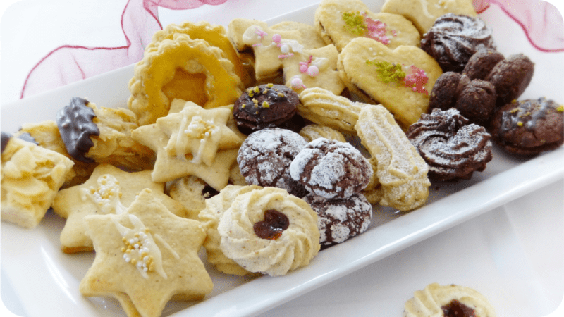 plate with several varieties of christmas cookies