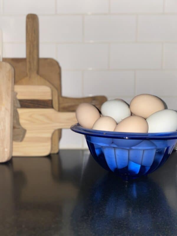 bowl of fresh eggs from our backyard chickens on the countertop in the kitchen.