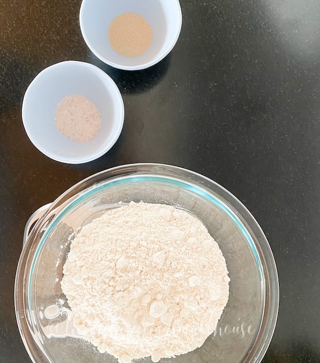 flour, salt and yeast for sourdough pizza dough