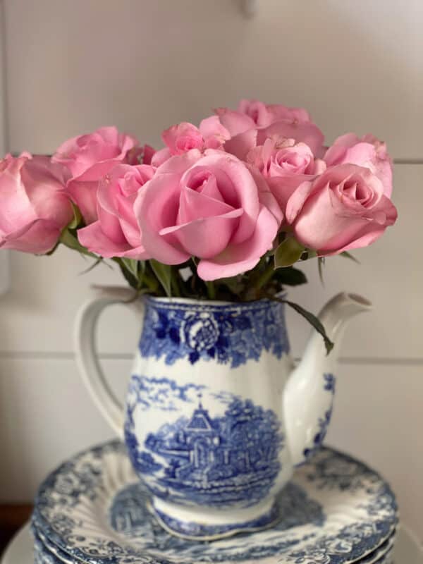 pink roses in a flow blue pitcher for elegant Valentine's Day decor