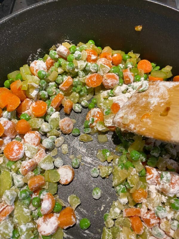 chicken pot pie veggie mixture with flour added to thicken sauce